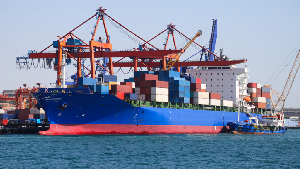 Cargo ship at an international port illustrating trade finance and global trade.